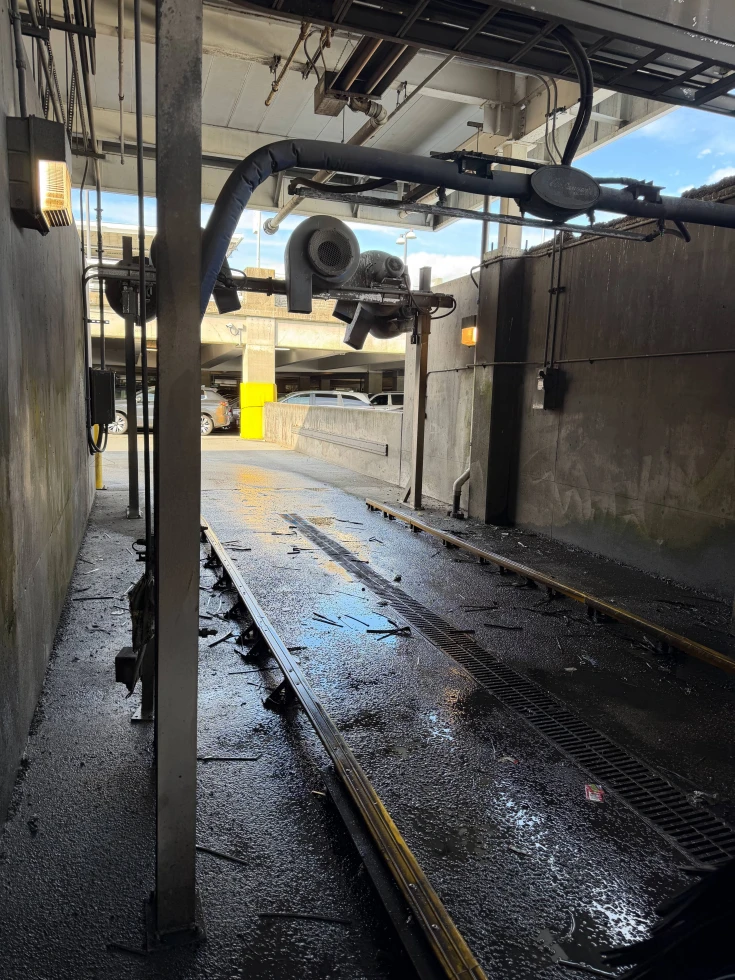 Pressure Washing Left Car Wash Bay Before